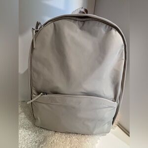 NWT ATHLETA ALL ABOUT BACKPACK cream BackPack Beige pockets water repellent